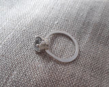 Claw set Crown ring 7mm white topaz