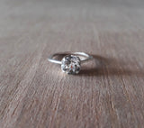 Claw set Crown ring 7mm white topaz